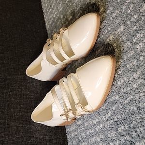 White flats with buckles